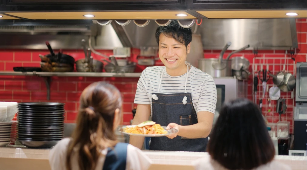 現地で働く留学生